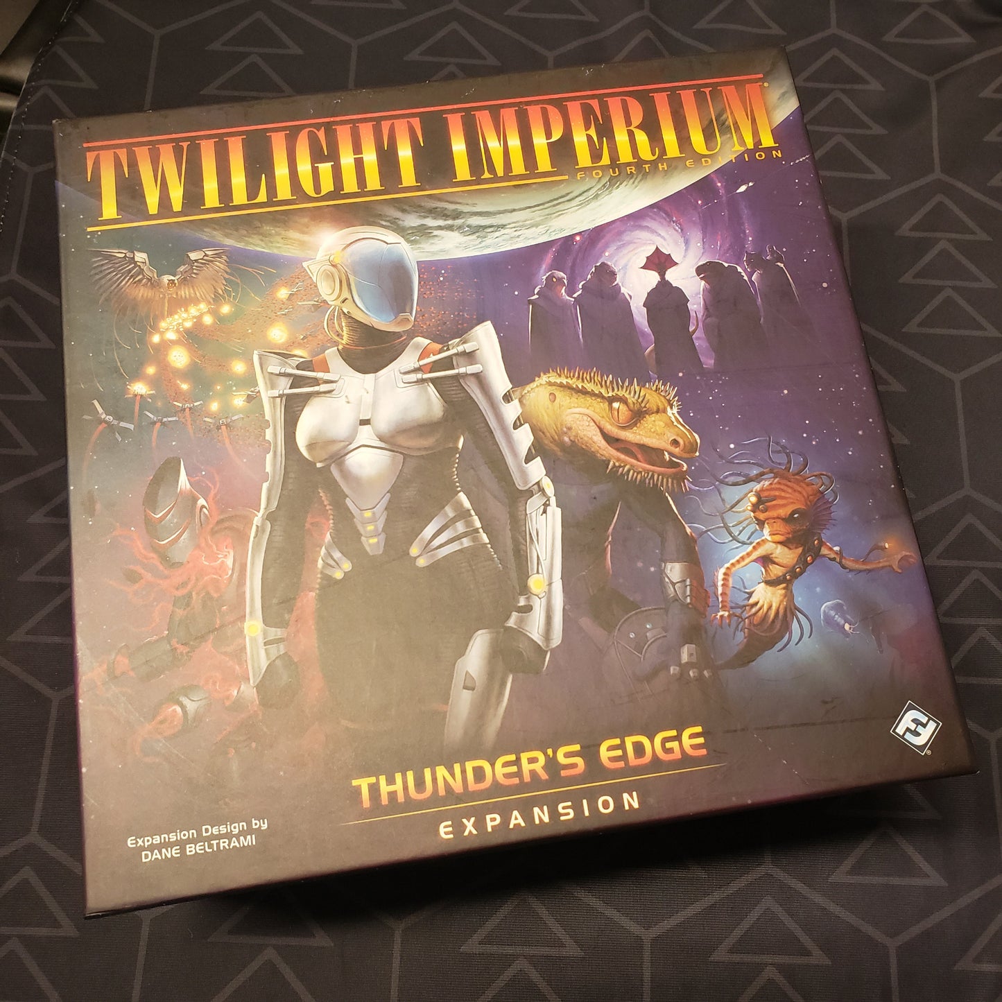 Image shows the front cover of the box of the Thunder's Edge expansion for the board game Twilight Imperium