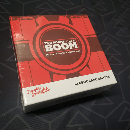 Image shows the front cover of the box of the Two Rooms and a Boom card game