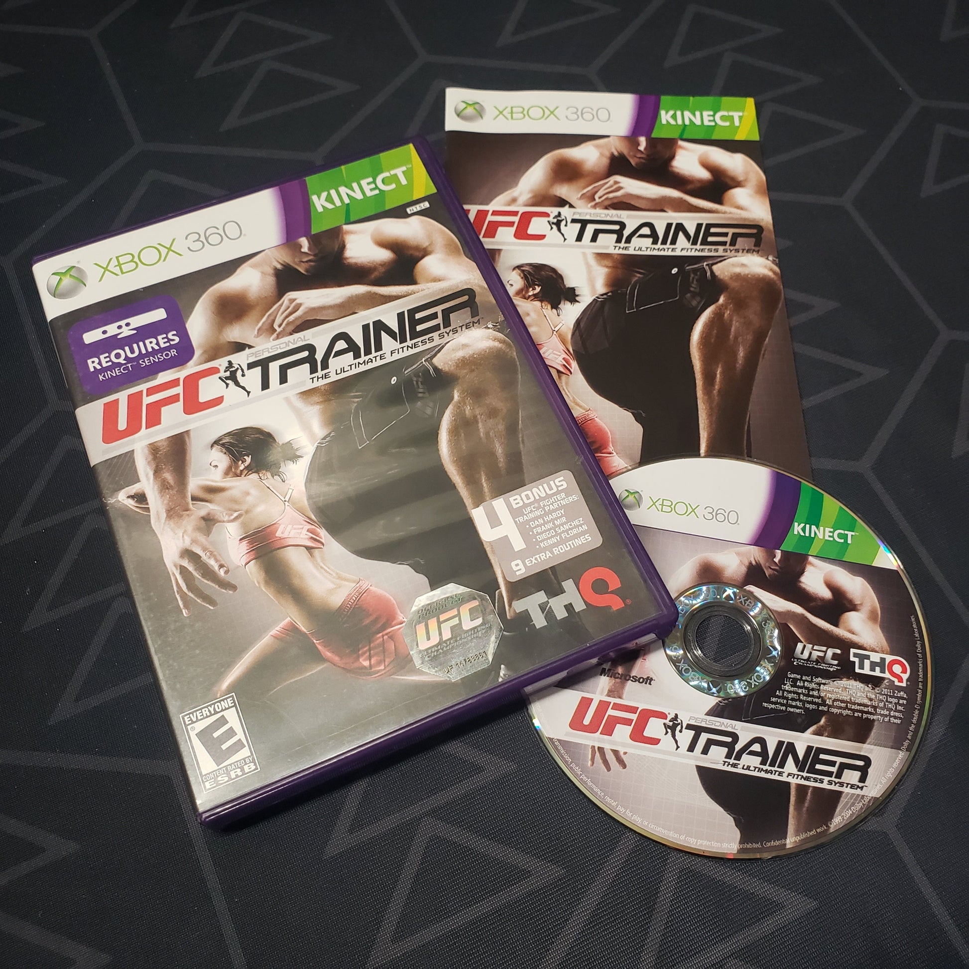 Image shows the case, manual and disc for the video game UFC Personal Trainer for Xbox 360
