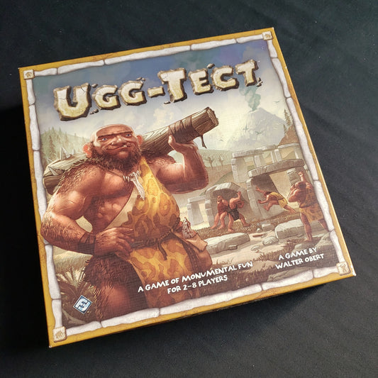 Image shows the front cover of the box of the Ugg-Tect board game
