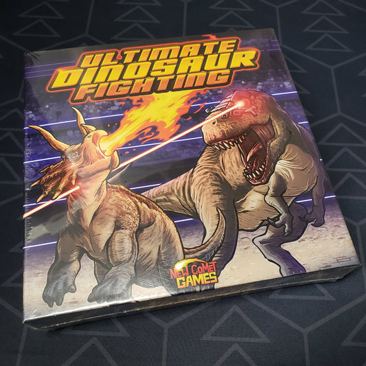 Image shows the front cover of the box of the Ultimate Dinosaur Fighting board game