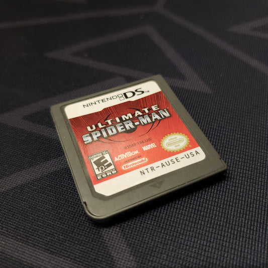Image shows the front of the cartridge for the video game Ultimate Spider-Man for Nintendo DS