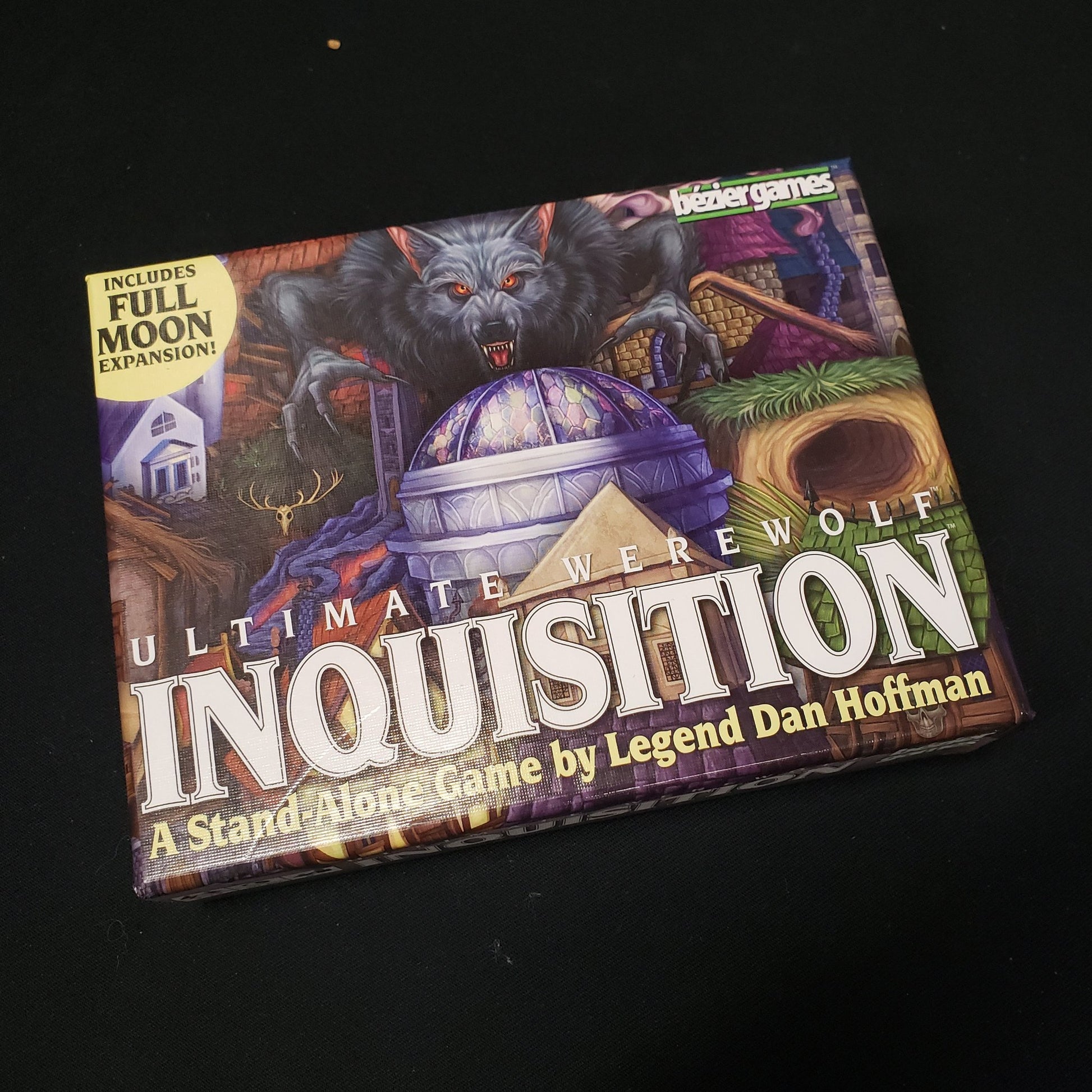 Image shows the front cover of the box of the Ultimate Werewolf:Inqusition party game