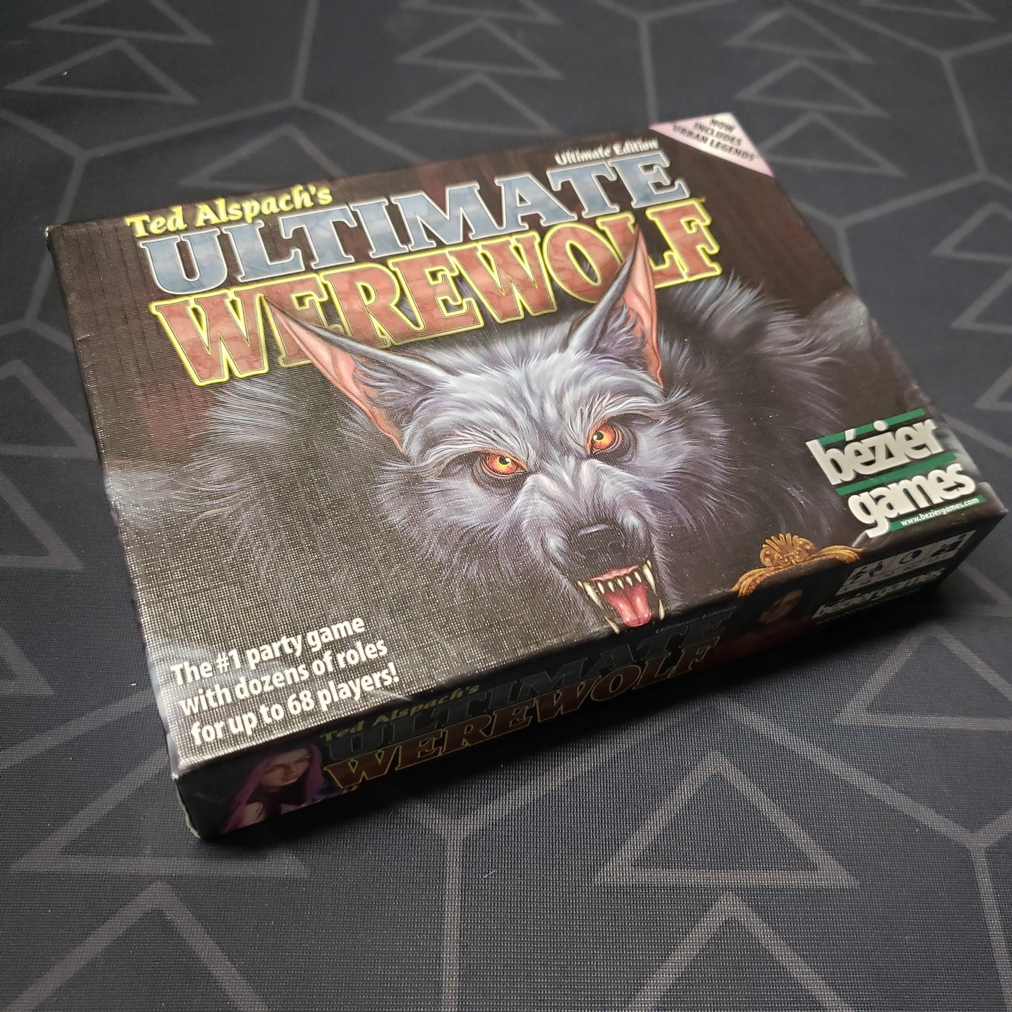 Image shows the front cover of the box for the Ultimate Werewolf: Ultimate Edition card game