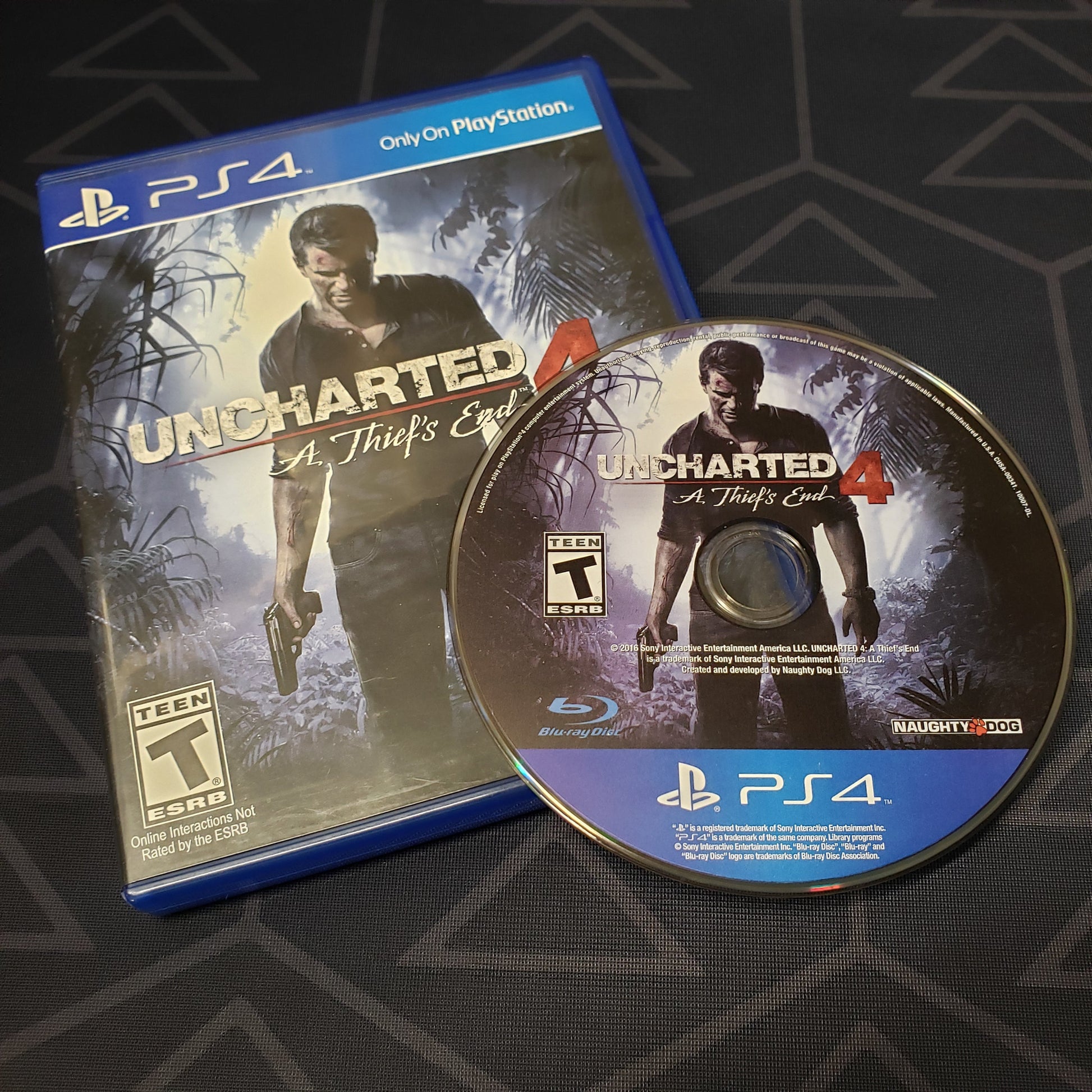 Image shows the case & disc for the video game Uncharted 4: A Thief's End for Playstation 4