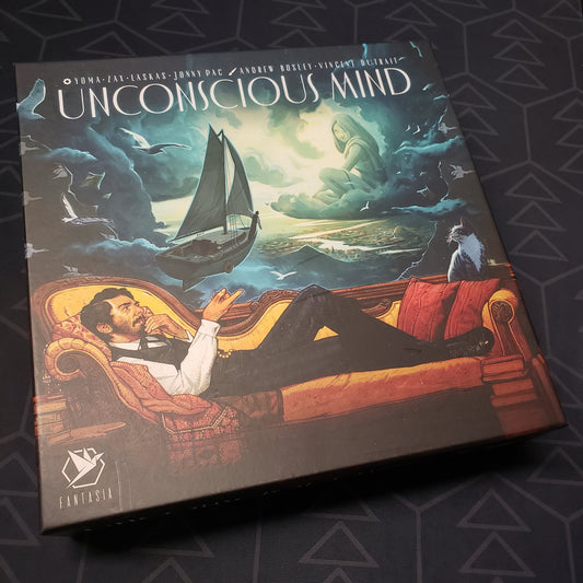 Image shows the front cover of the box for the Unconscious Mind board game