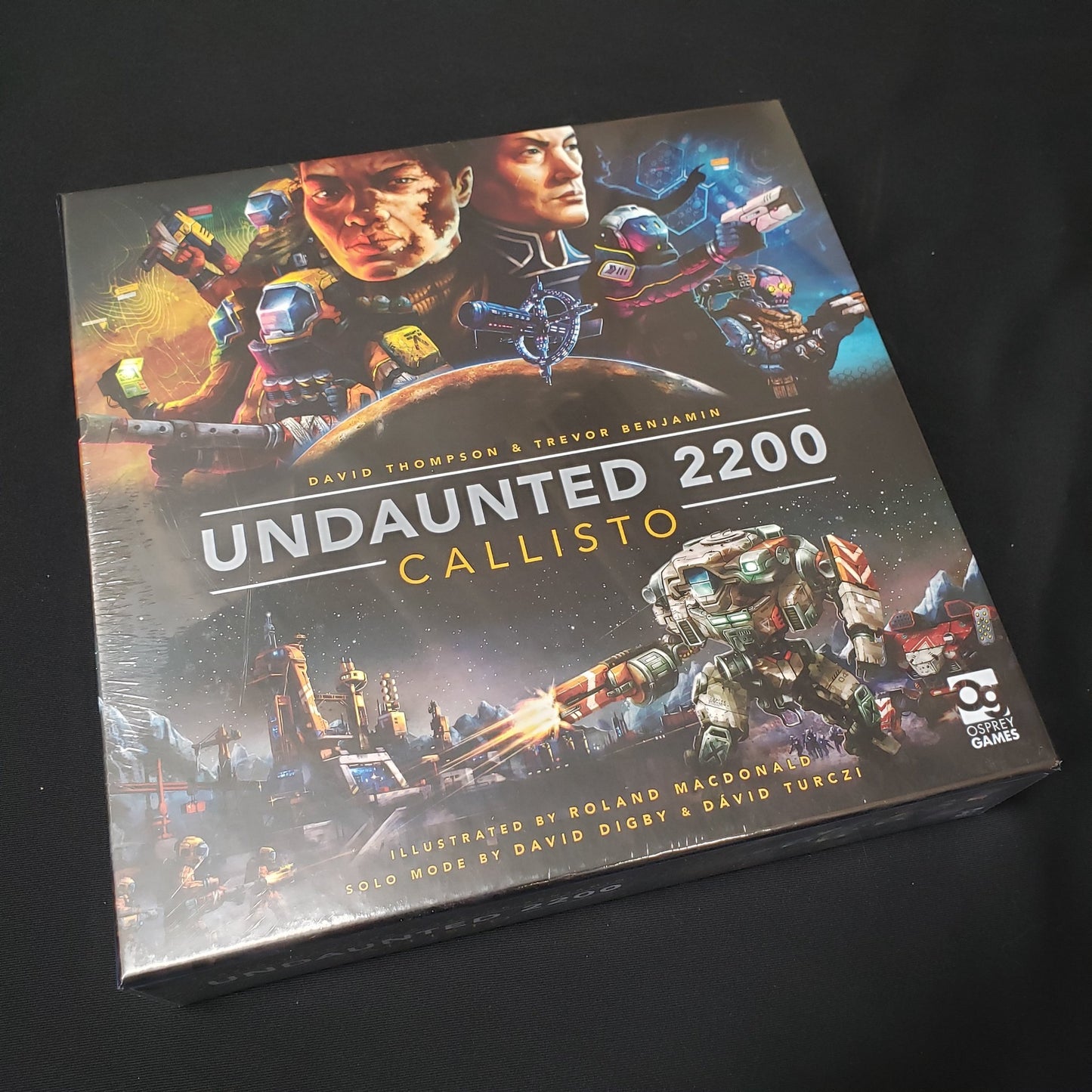 Image shows the front cover of the box of the Undaunted 2200: Callisto board game