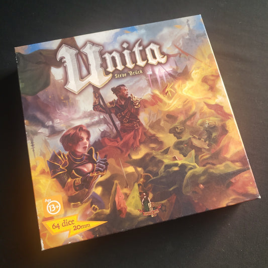 Image shows the front cover of the box of the Unita board game