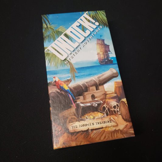 Image shows the front cover of the box of the Unlock!: The Tonipals Treasure card game