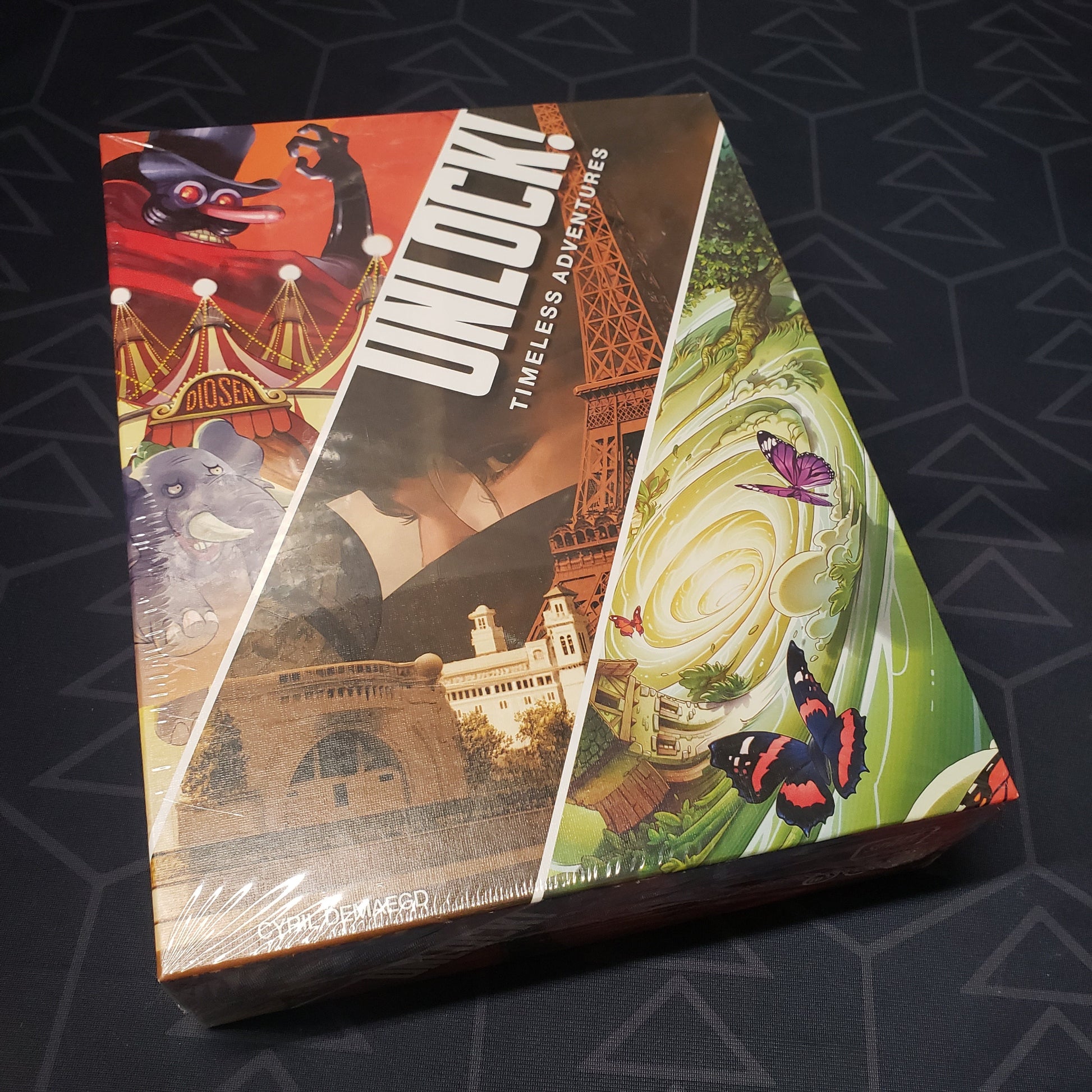 Image shows the front cover of the box of the Unlock!: Timeless Adventures card game
