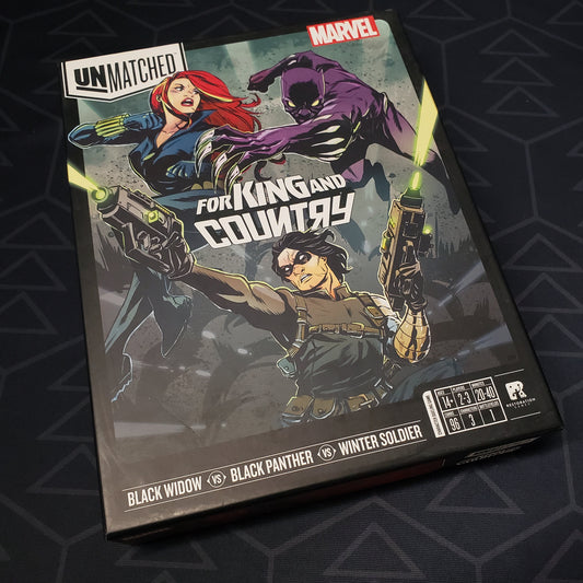 Image shows the front cover of the box of the Unmatched: For King and Country board game