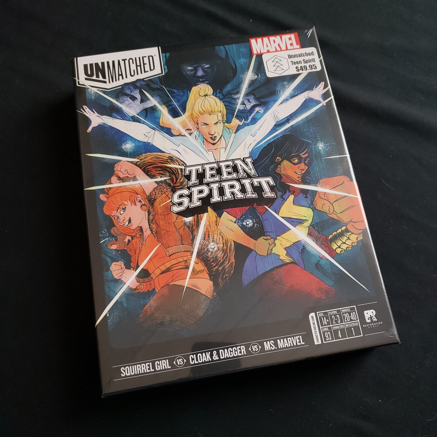 Image shows the front cover of the box of the Unmatched: Teen Spirit board game