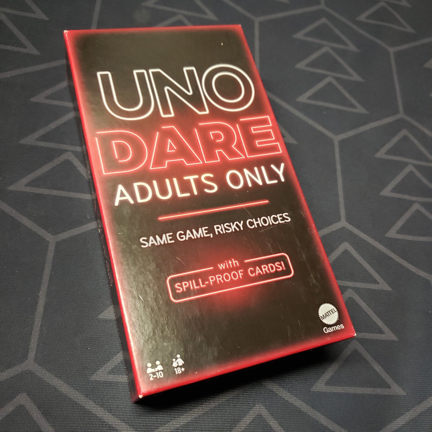 Image shows the front cover of the box for the UNO Dare: Adults Only card game