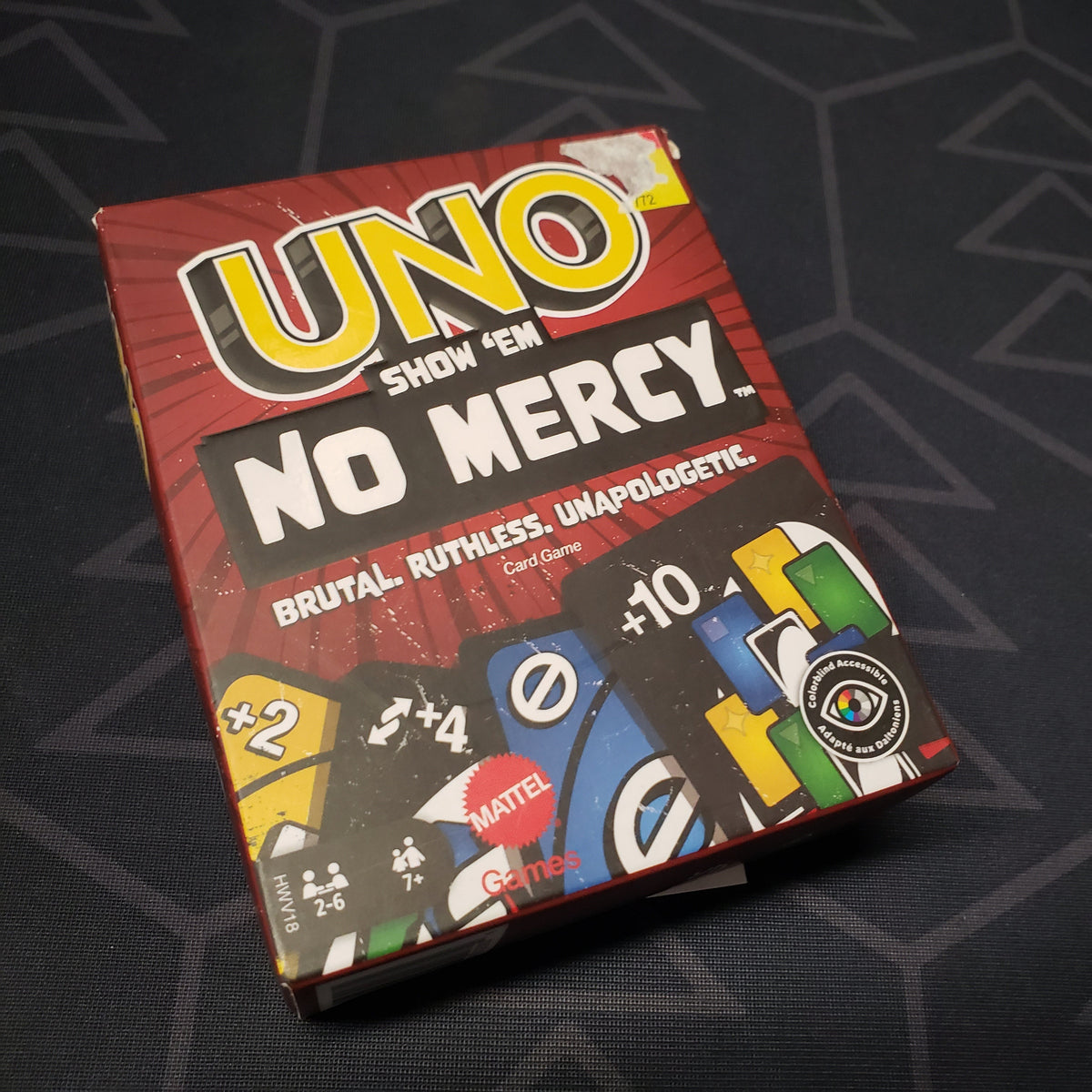 Image shows the front cover of the box for the UNO: Show 'Em No Mercy card game