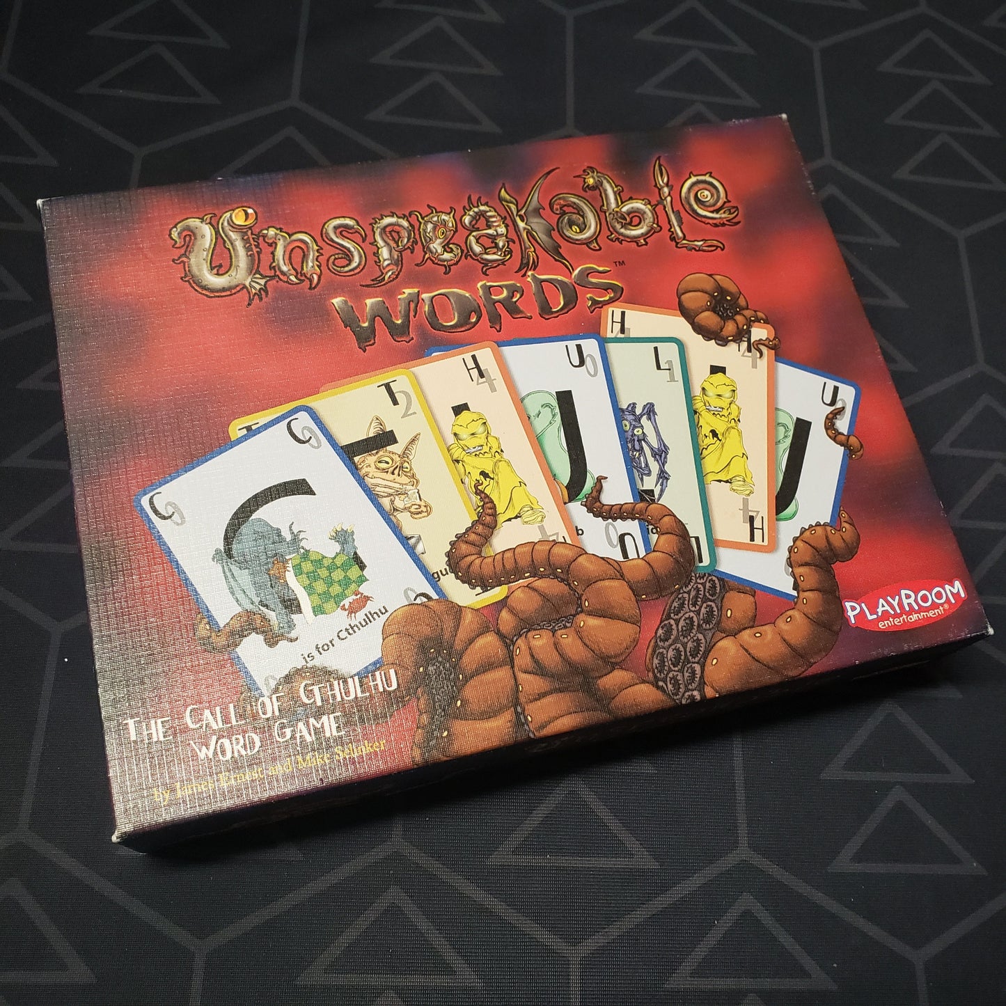 Image shows the front cover of the box for the Unspeakable Words card game