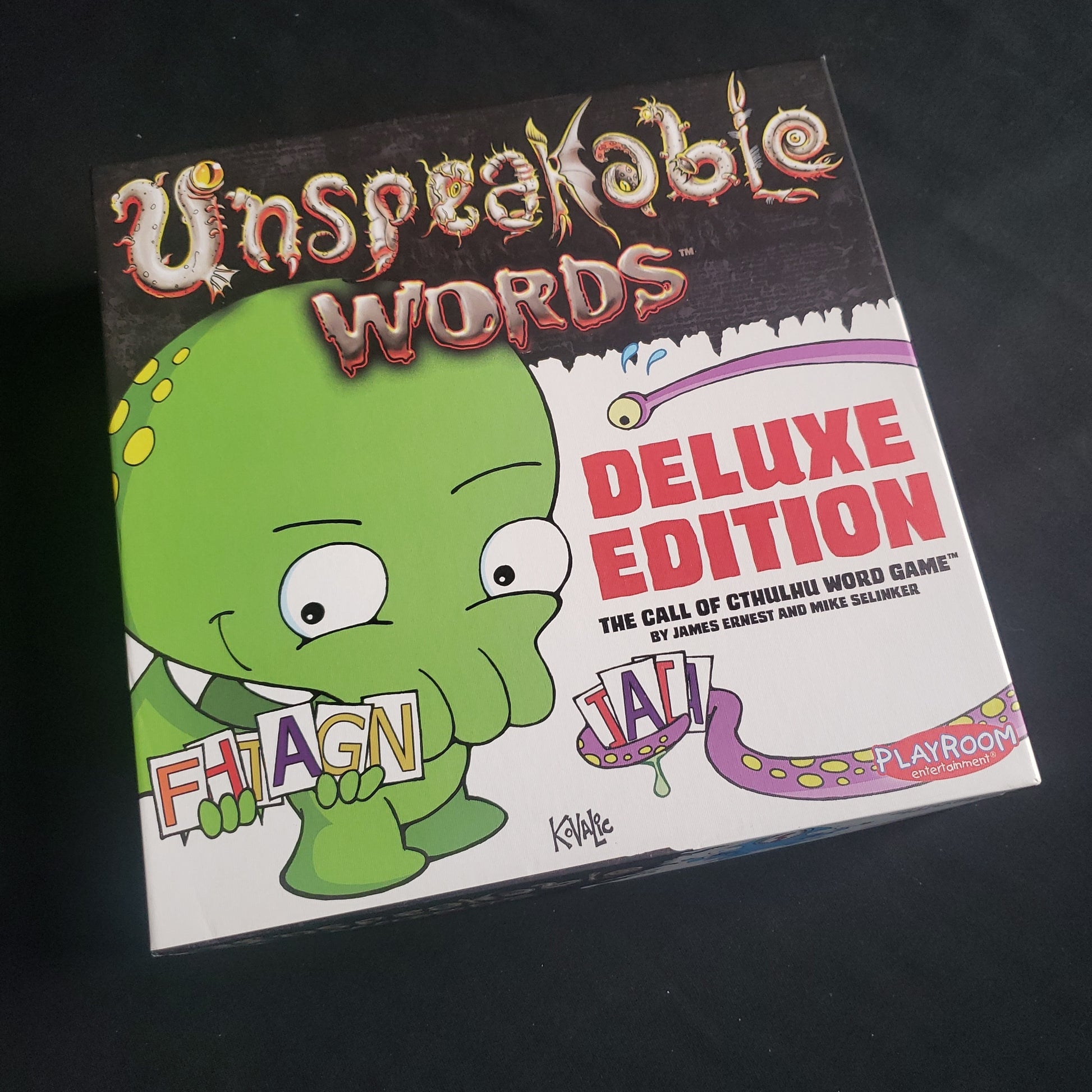 Image shows the front cover of the box of the Unspeakable Words: Deluxe Edition board game