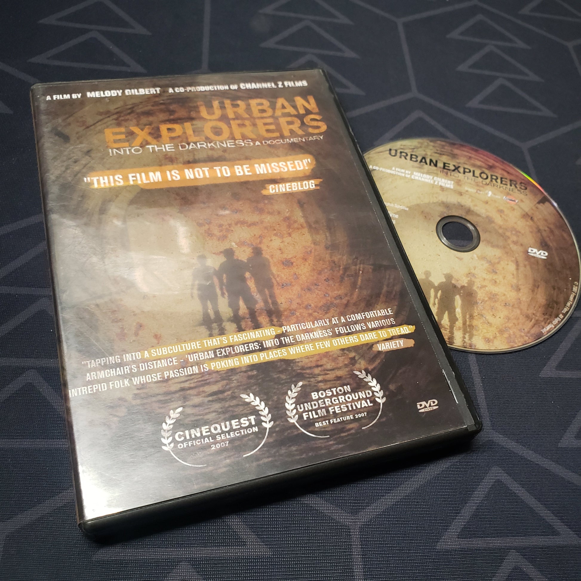 Image shows the case & disc for the movie Urban Explorers: Into the Darkness on DVD