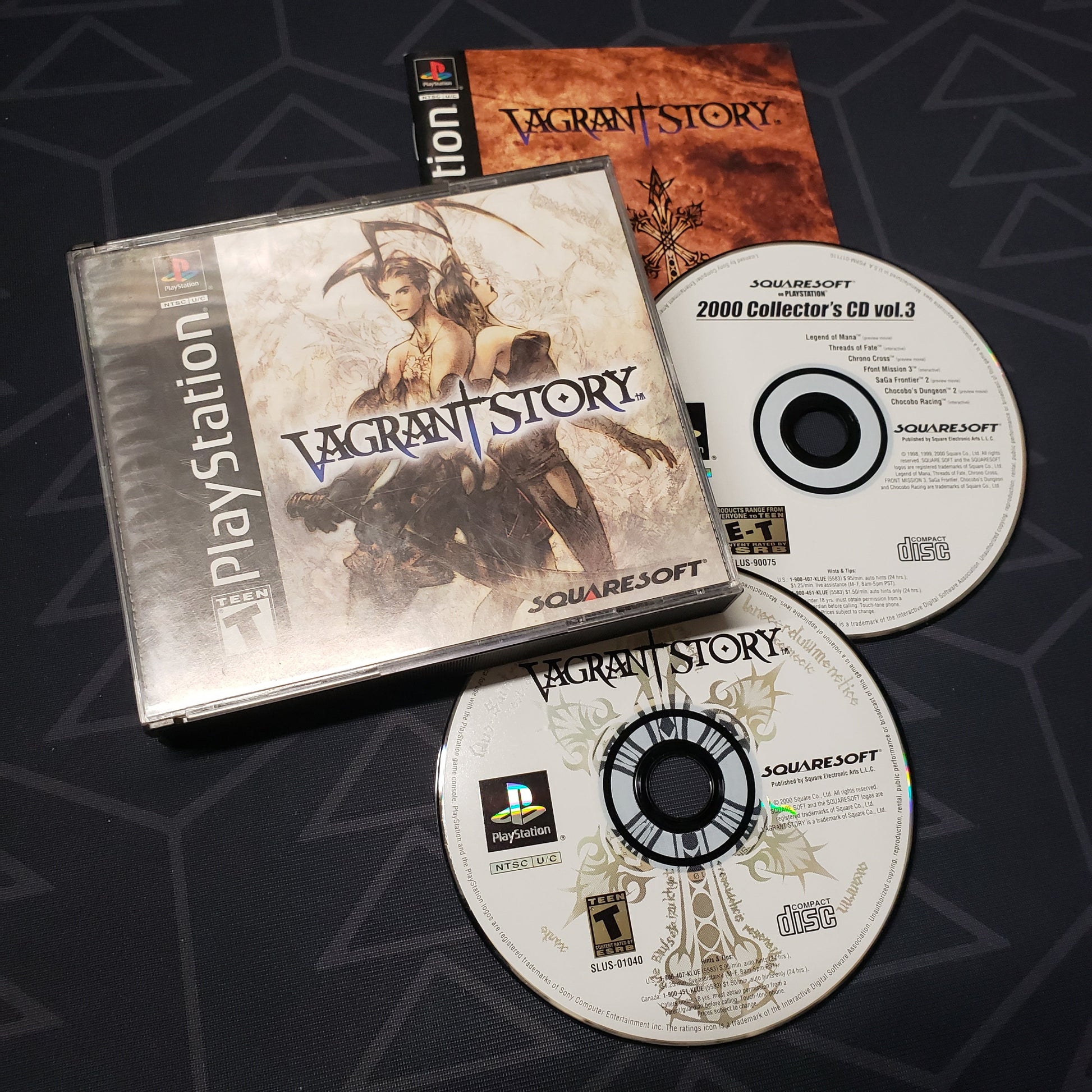 Image shows the jewel case, manual and two discs for the video game Vagrant Story for Playstation 1