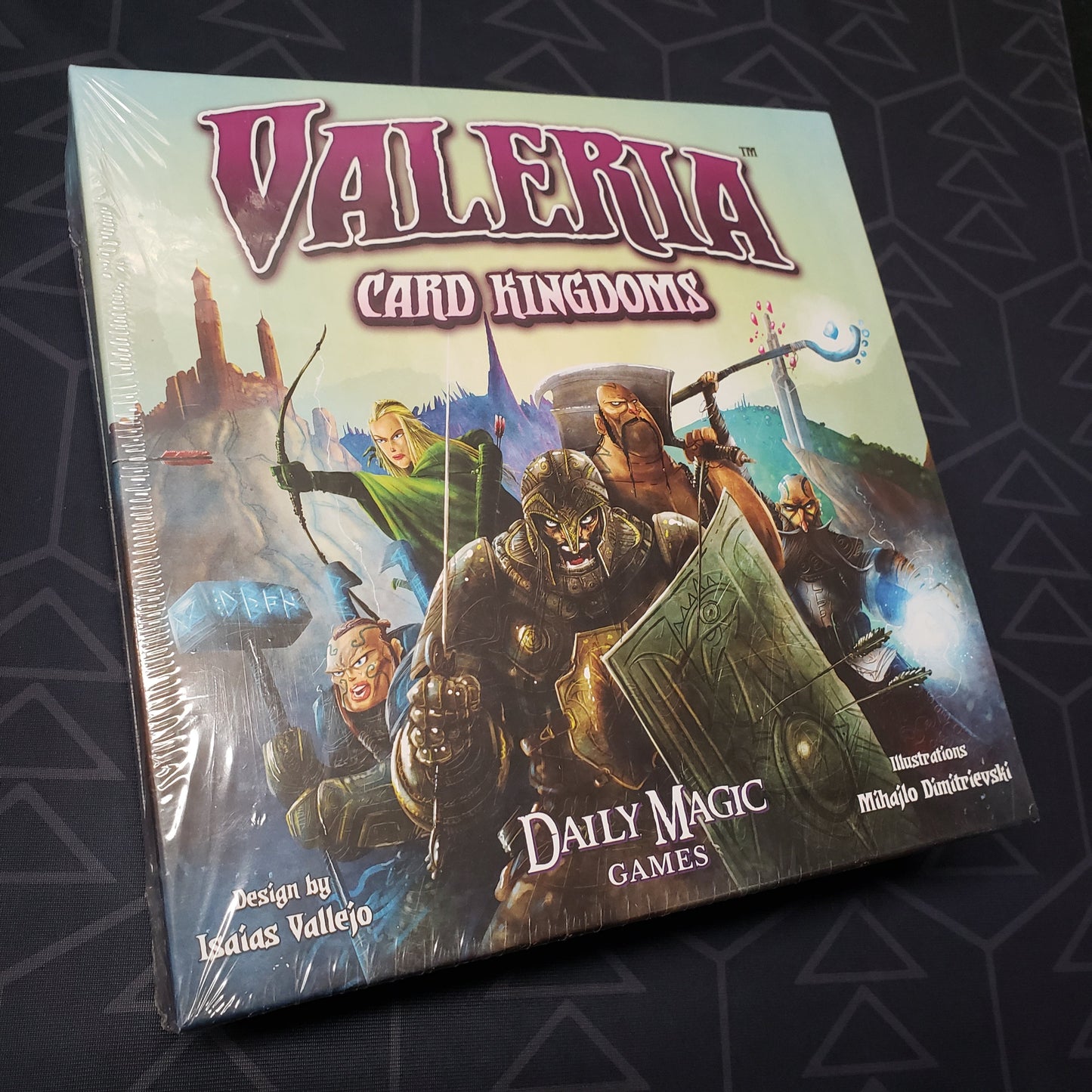 Image shows the front cover of the box for the Valeria: Card Kingdoms card game