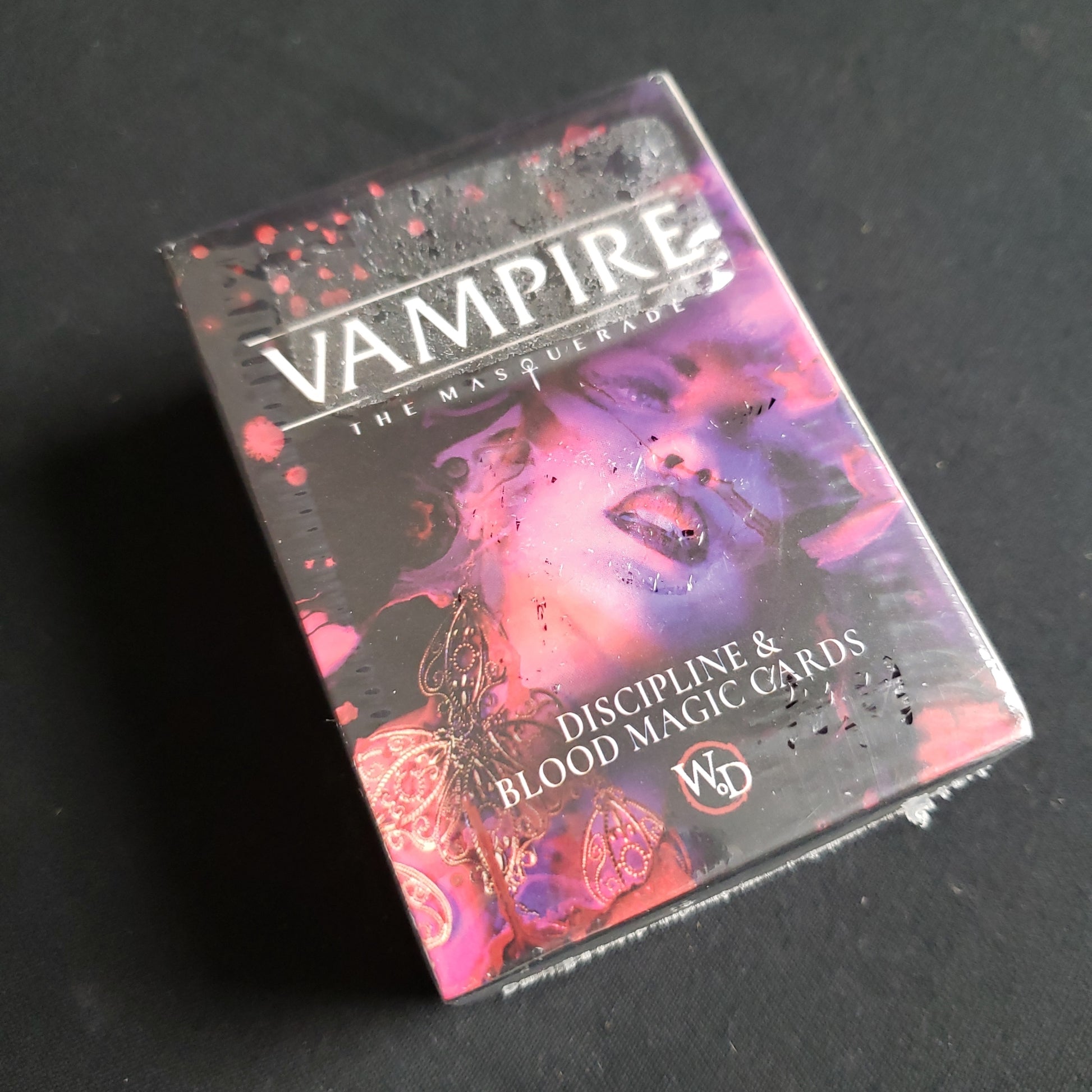 Image shows the front of the box of the Discipline & Blood Magic Cards for the Vampire: The Masquerade roleplaying game