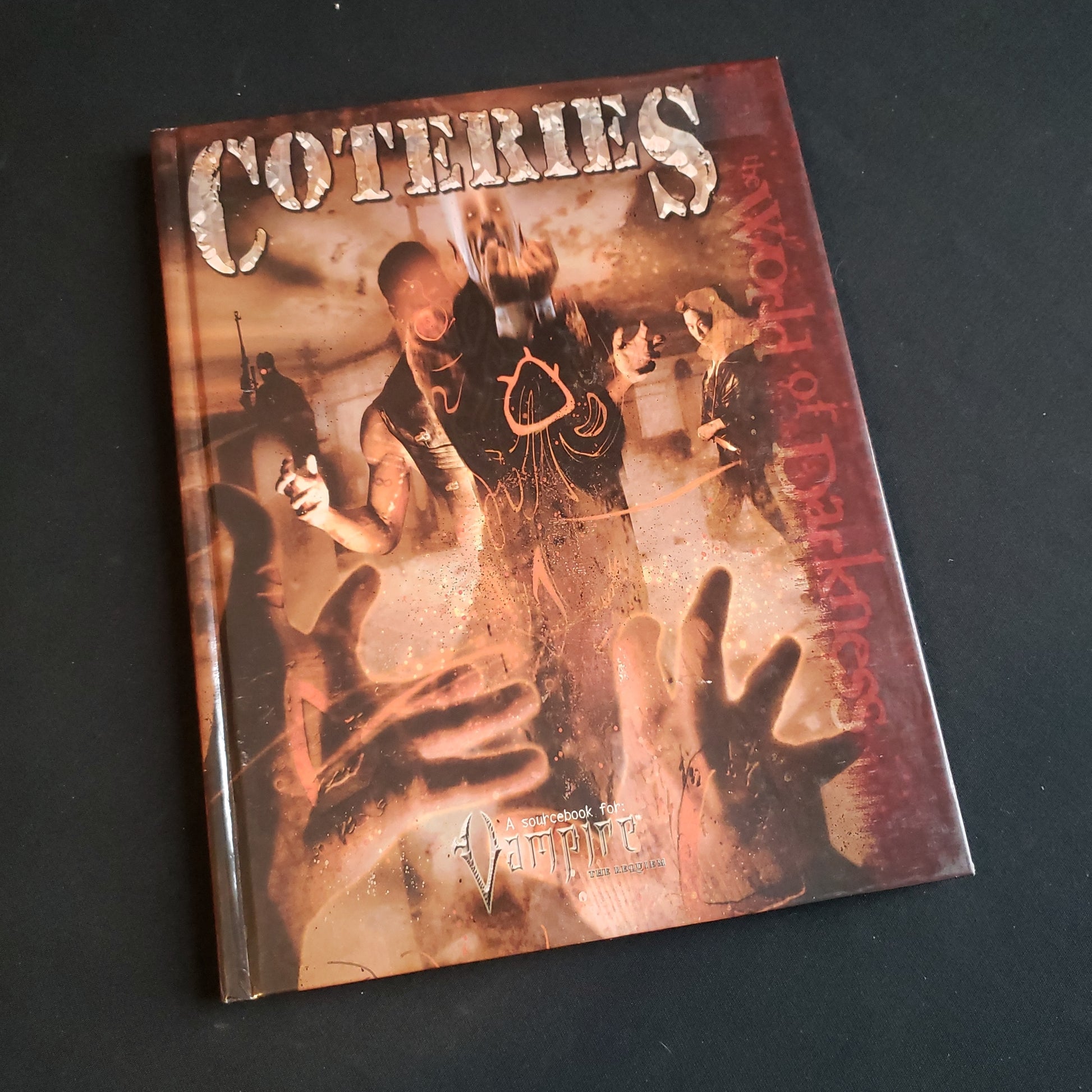 Image shows the front cover of the Coteries book for the Vampire: The Requiem roleplaying game