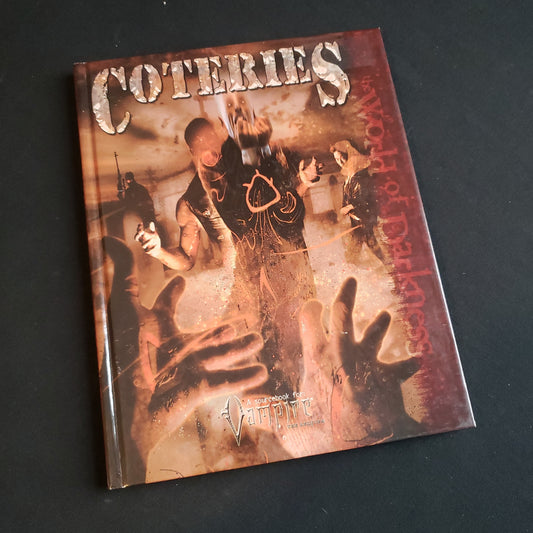 Image shows the front cover of the Coteries book for the Vampire: The Requiem roleplaying game