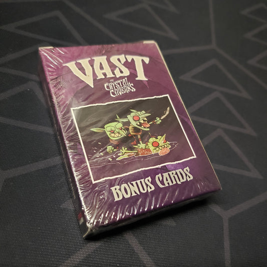 Image shows the front cover of the box of the Bonus Cards expansion for the board game Vast: The Crystal Caverns