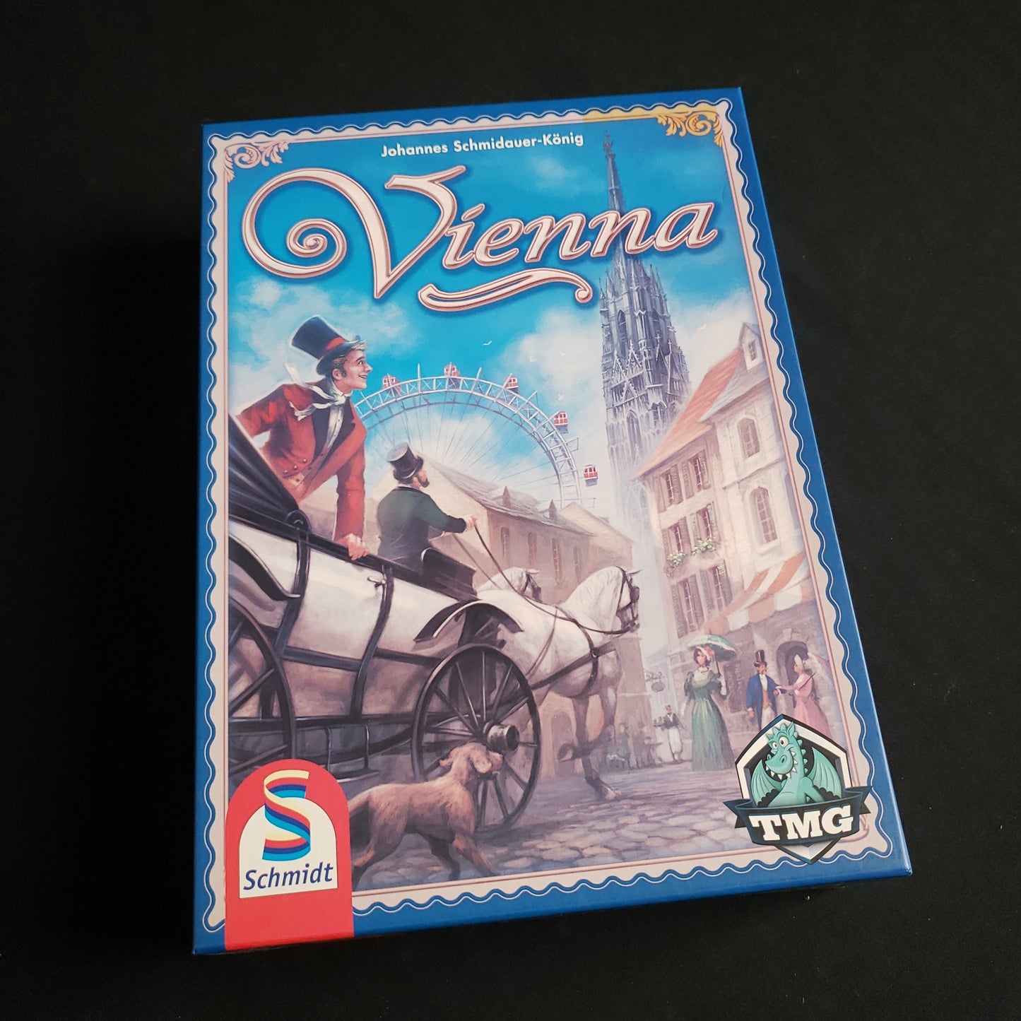 Image shows the front cover of the box of the Vienna board game