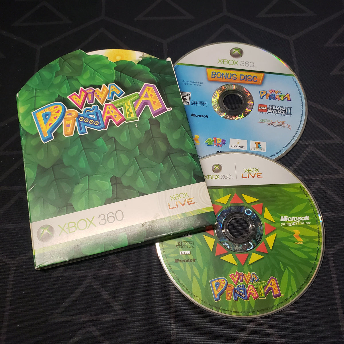 Image shows the case and two discs for the video game Viva Pinata for Xbox 360