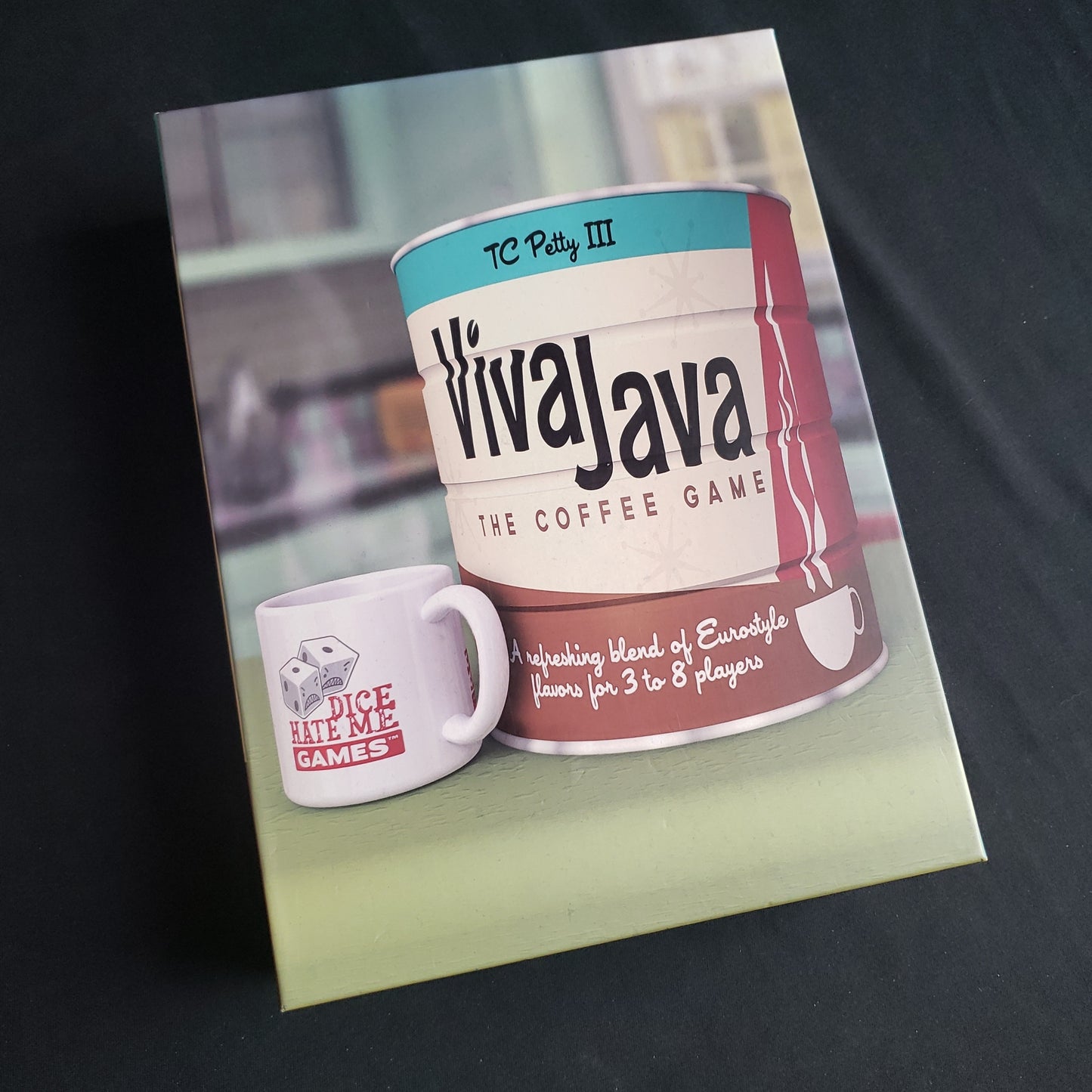 Image shows the front cover of the box of the board game VivaJava: The Coffee Game