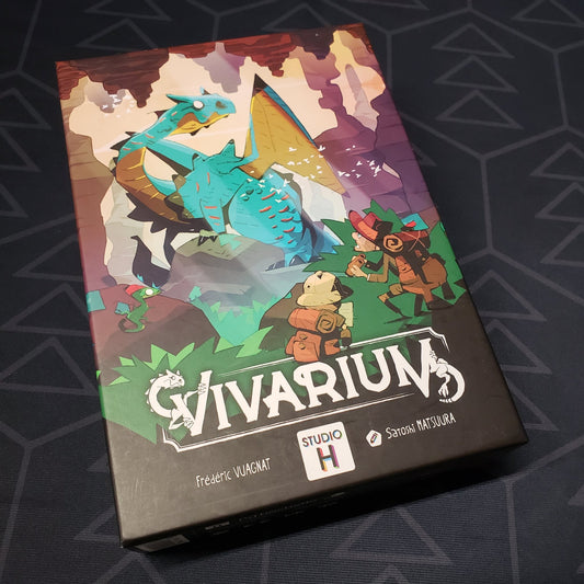 Image shows the front cover of the box of the Vivarium card game