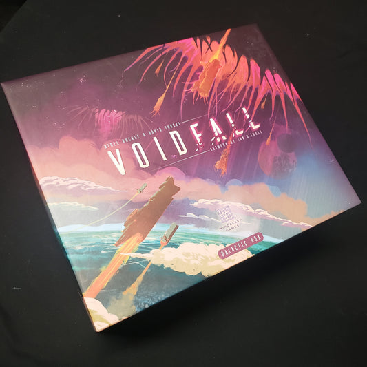 Image shows the front cover of the Galactic Box edition for the board game Voidfall