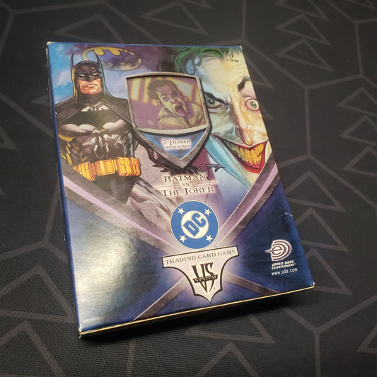 Image shows the front cover of the box for the VS. System: Batman vs. Joker card game