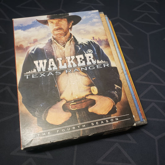 Image shows the front of the outer box & four fanned-out disc cases for the fourth season of Walker, Texas Ranger on DVD