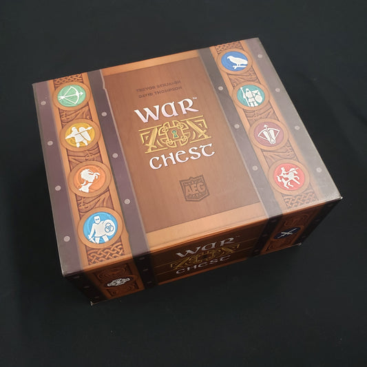 Image shows the front cover of the box of the War Chest board game