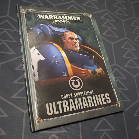 Image shows the front cover of the Warhammer 40,000 (Eighth Edition): Codex Supplement - Ultramarines wargaming book