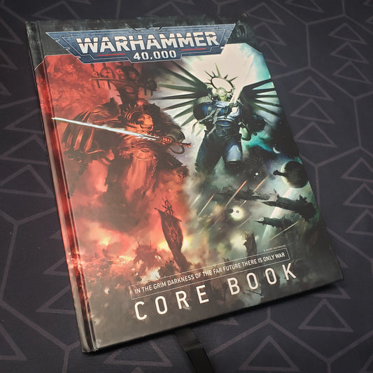 Image shows the front cover of the Warhammer 40,000: Ninth Edition Core Rulebook wargaming book