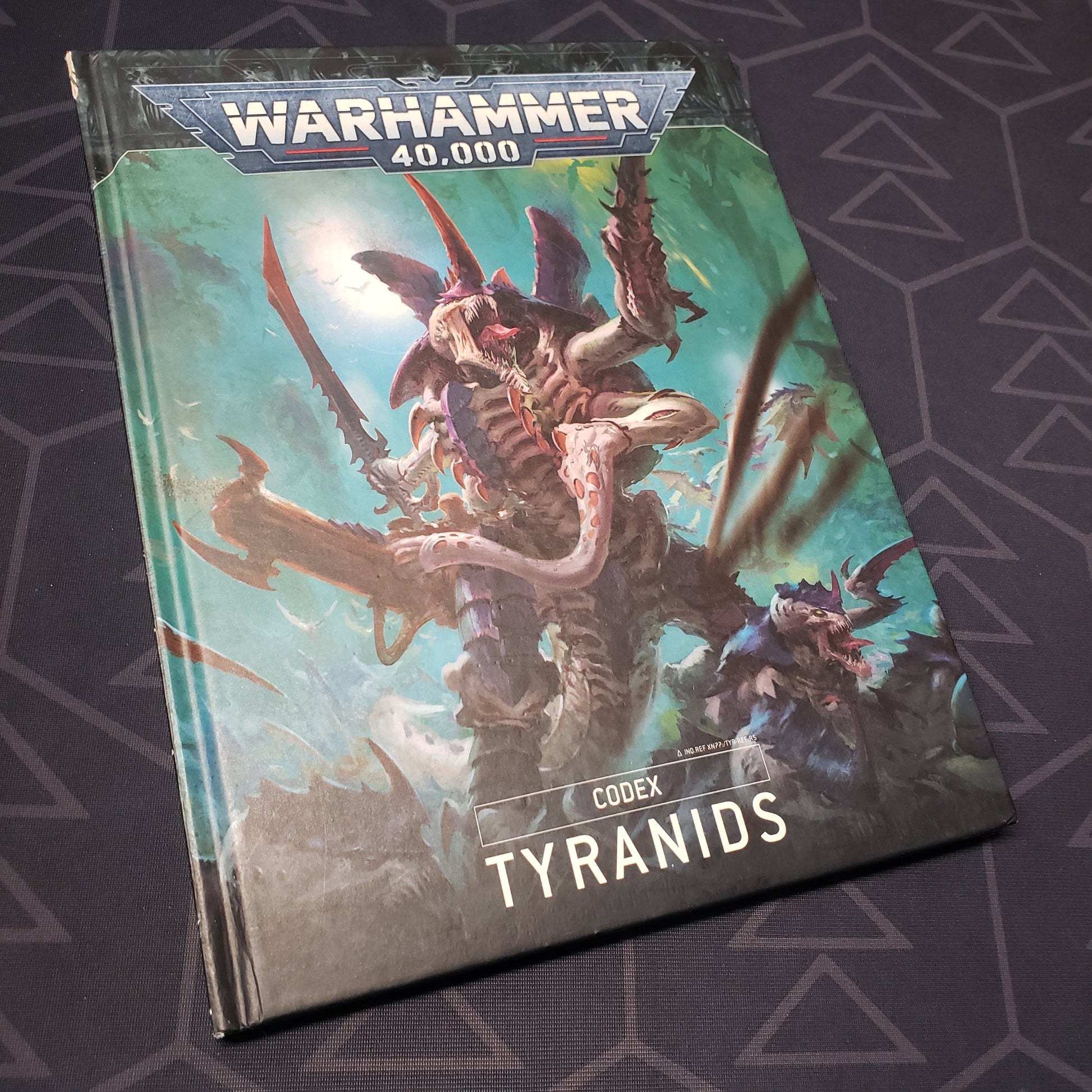 Image shows the front cover of the Warhammer 40,000 (Tenth Edition): Codex - Tyranids wargaming book