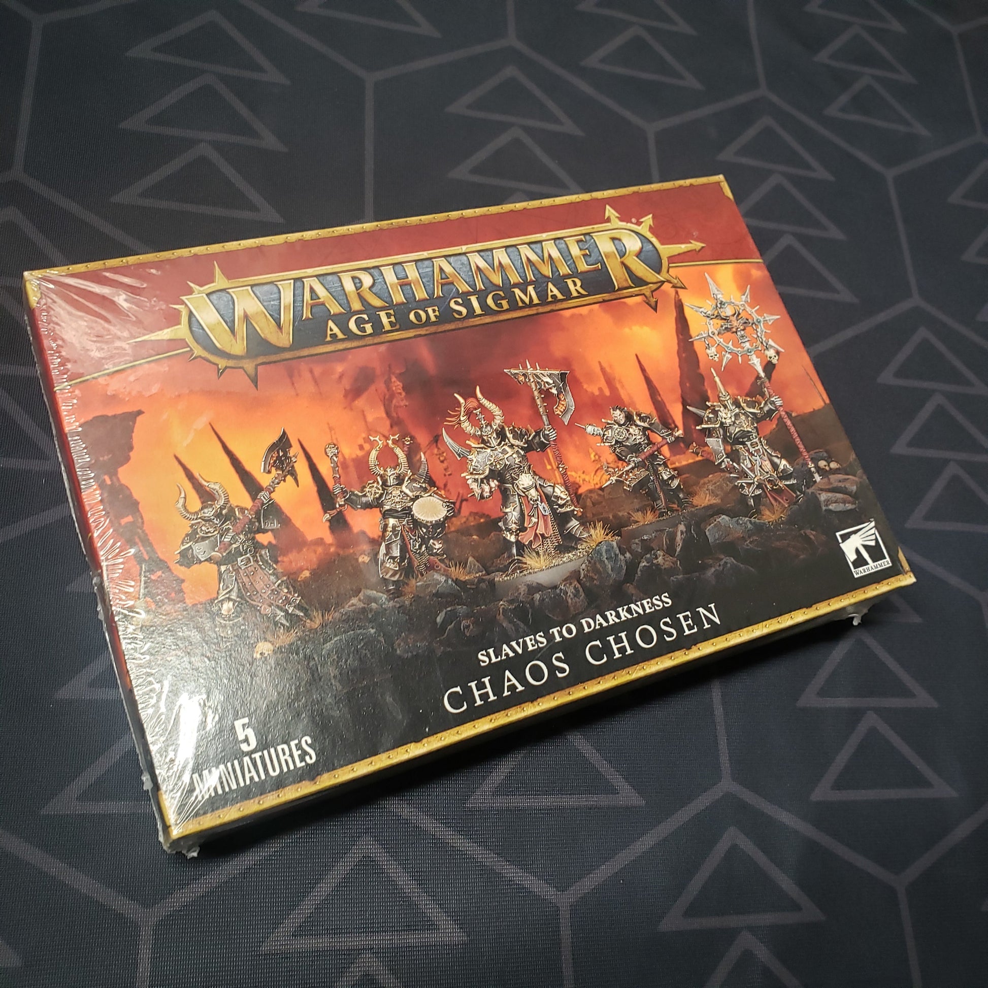 Image shows the front cover of the box of the Slaves to Darkness: Chaos Chosen pack for the miniatures game Warhammer Age of Sigmar