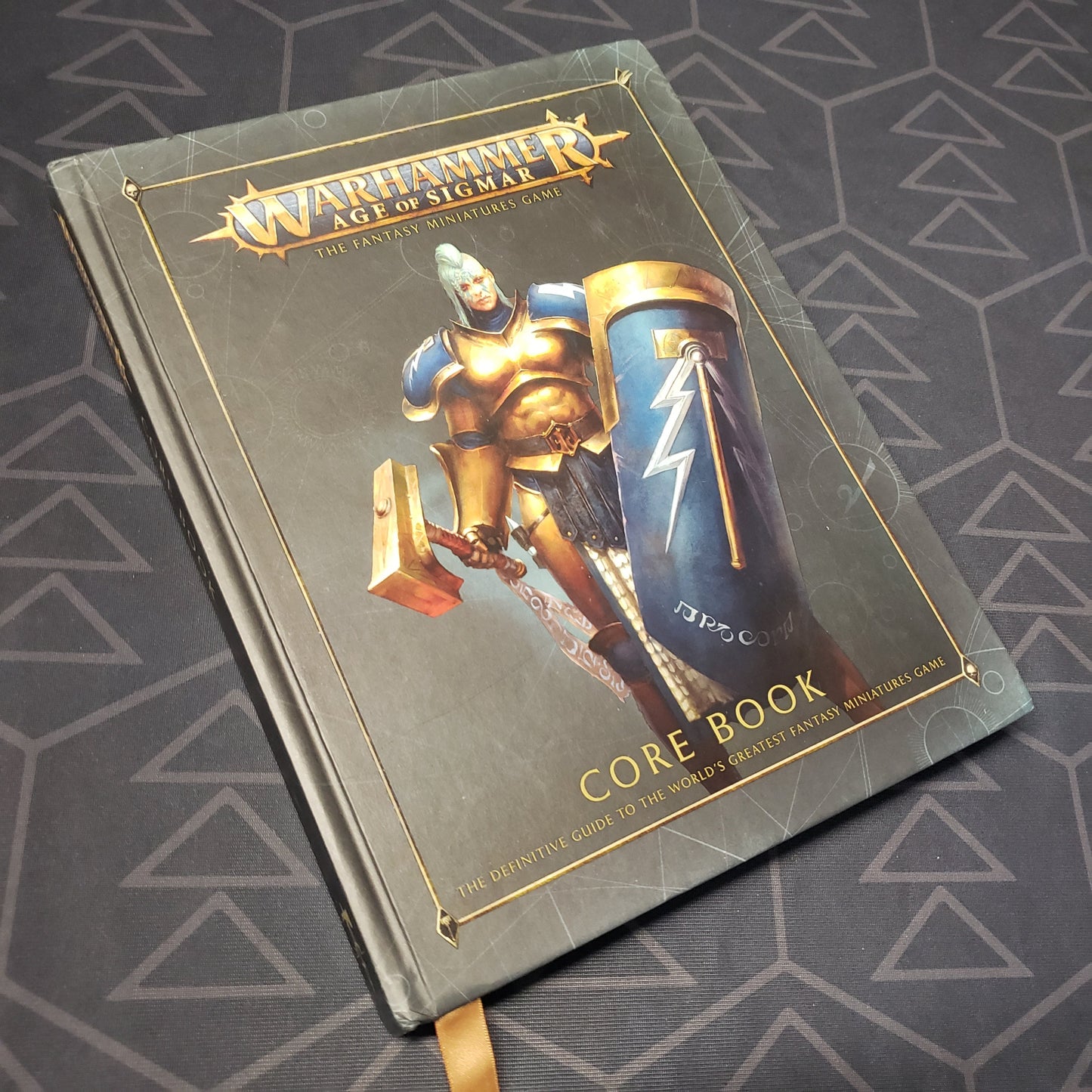 Image shows the front cover of the Warhammer: Age of Sigmar - Second Edition Core Rulebook wargaming book