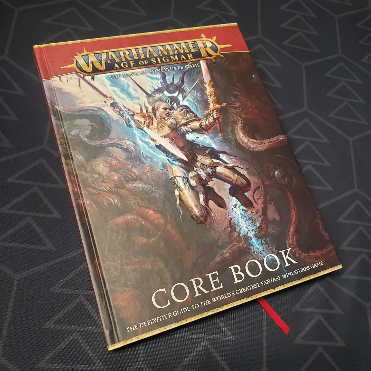 Image shows the front cover of the Warhammer: Age of Sigmar - Third Edition Core Rulebook wargaming book