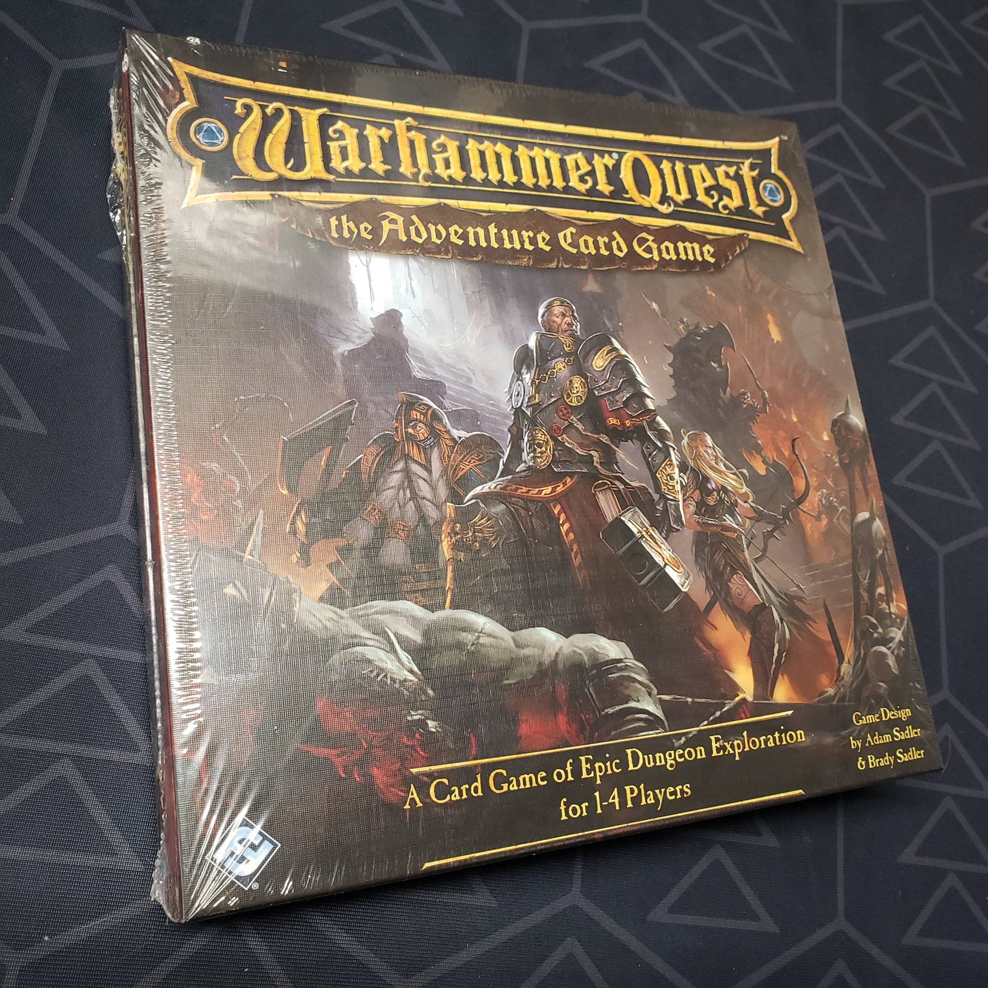 Image shows the front cover of the box for Warhammer Quest: The Adventure Card Game