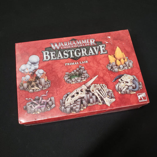 Image shows the front cover of the box of the Primal Lair terrain pack for the board game Warhammer Underworlds: Beastgrave