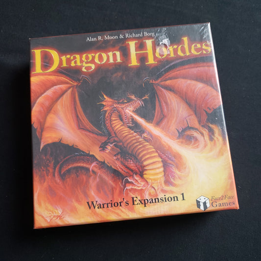 Image shows the front cover of the box of the Dragon Hordes expansion for the Warriors card game