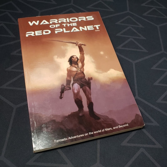 Image shows the front cover of the core rulebook for the roleplaying game Warriors of the Red Planet