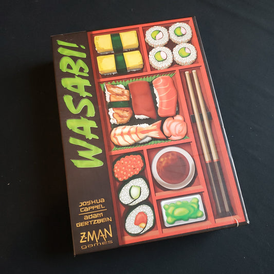 Image shows the front cover of the box of the Wasabi! board game