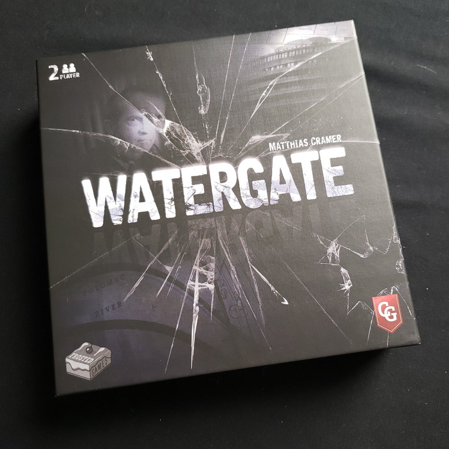 Image shows the front cover of the box of the Watergate board game