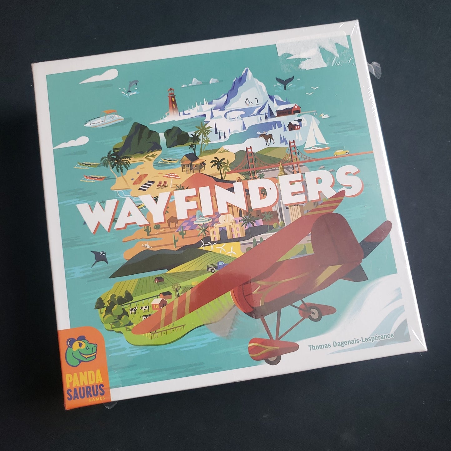 Image shows the front cover of the box of the Wayfinders board game