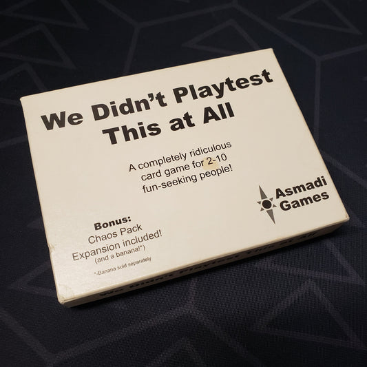 Image shows the front cover of the box of the card game We Didn't Playtest This at All