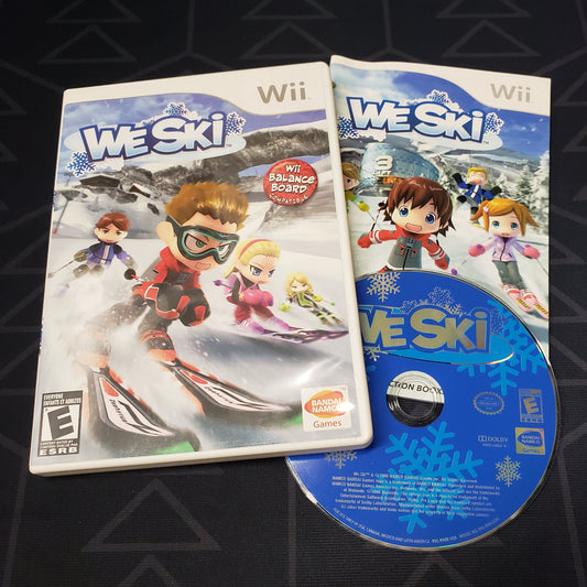 Image shows the case, manual & disc for the video game We Ski for Nintendo Wii